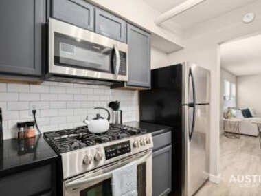 Walk to Restaurants or Cook in Subway Tile Kitchen